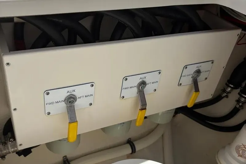Slide: The Image of Fuel valve controls on a 2017 Jupiter 38 FS boat. - 31