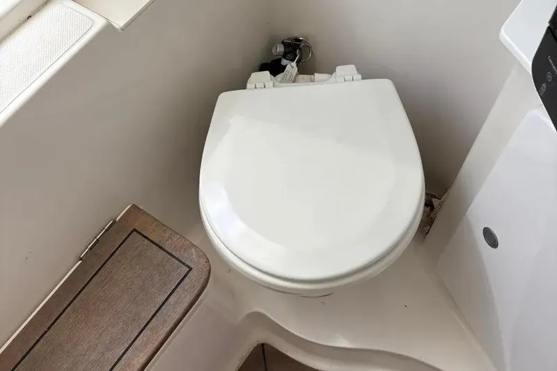 Slide: The Image of Boat bathroom with toilet in 2017 Jupiter 38 FS model. - 7