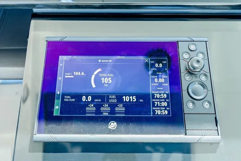Slide: The Image of Dashboard display of 2024 Formula 380 Super Sport Crossover OB showing fuel and engine data. - 23