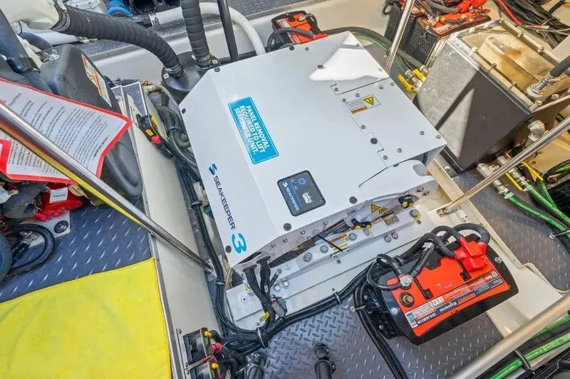 Slide: The Image of 2024 Formula 380 Super Sport Crossover OB engine compartment with Seakeeper 3 stabilizer. - 32