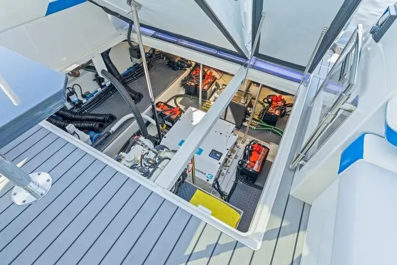 Slide: The Image of 2024 Formula 380 Super Sport Crossover OB engine compartment with advanced equipment and wiring. - 37