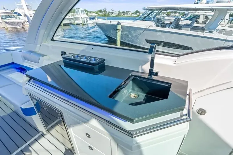 Slide: The Image of 2024 Formula 380 Super Sport Crossover OB yacht interior with sleek sink and countertop. - 41