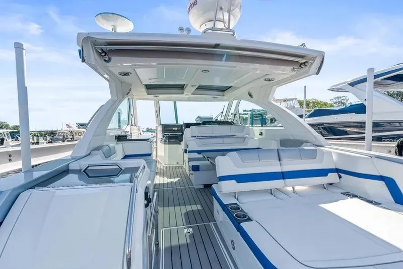 Slide: The Image of 2024 Formula 380 Super Sport Crossover OB luxury boat interior with spacious seating and modern design. - 51