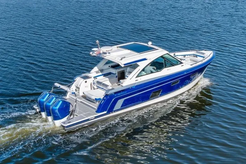 Slide: The Image of 2024 Formula 380 Super Sport Crossover OB cruising on open water. - 53