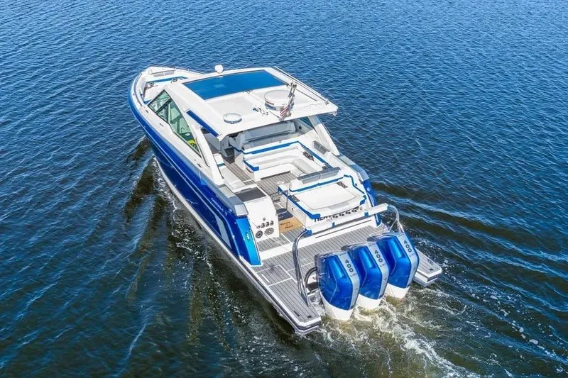 Slide: The Image of 2024 Formula 380 Super Sport Crossover OB cruising on open water. - 6