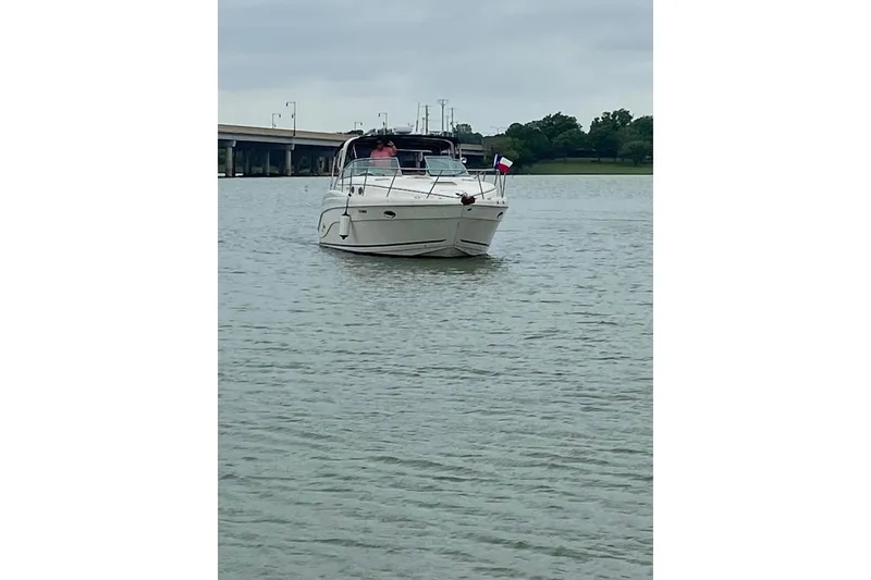 Slide: The Image of 2003 Rinker 342 Express Cruiser docked, named "Miss Linda Lou," Aubrey, Texas. - 5