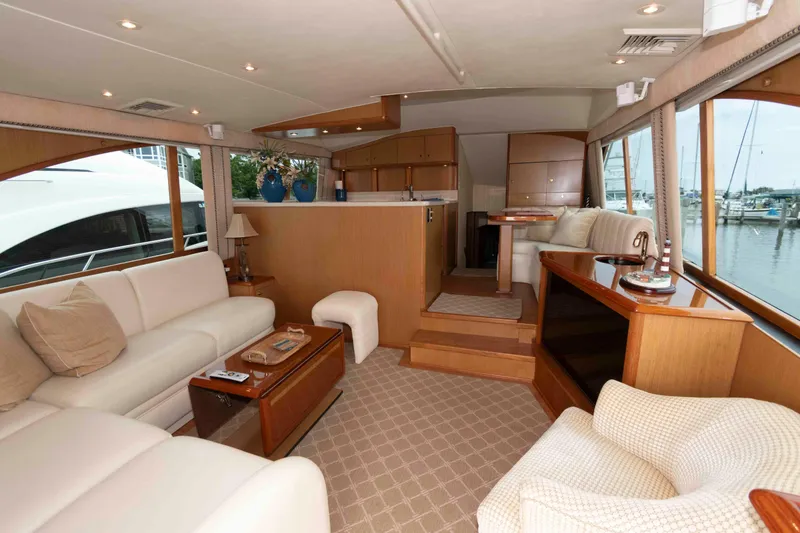 Slide: The Image of Luxurious interior of 2004 Ocean Yachts 52 SUPER SPORT with elegant seating and large windows. - 20