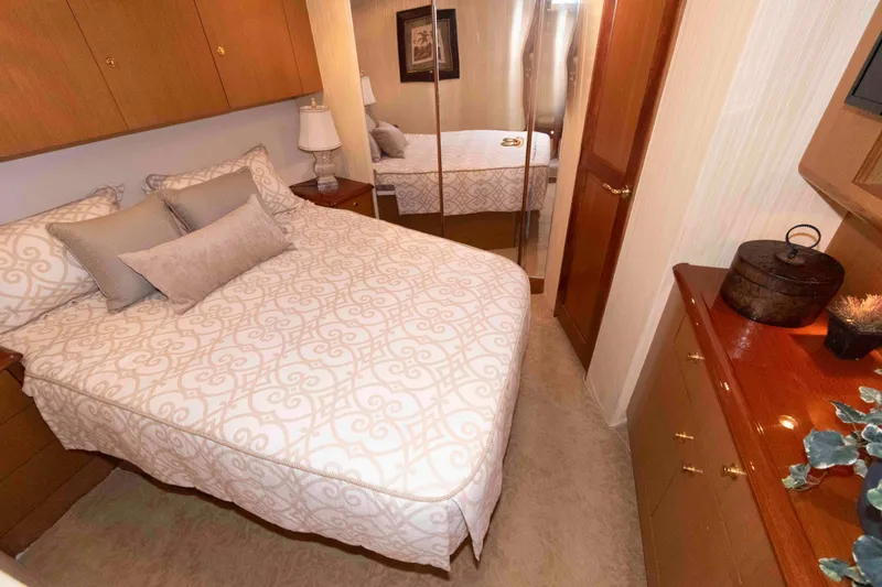 Slide: The Image of Luxurious bedroom interior of 2004 Ocean Yachts 52 Super Sport with elegant bedding and decor. - 31