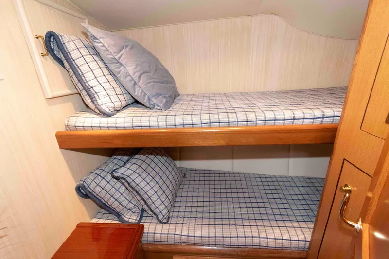 Slide: The Image of Bunk beds with plaid bedding in 2004 Ocean Yachts 52 SUPER SPORT cabin. - 33