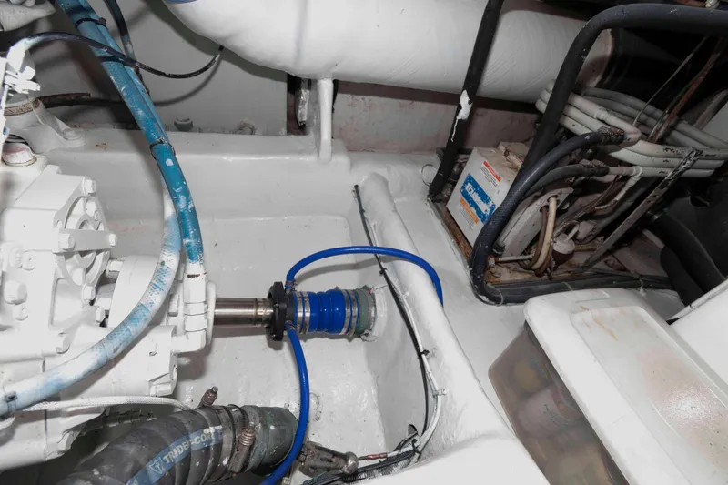 Slide: The Image of Engine room of 2004 Ocean Yachts 52 SUPER SPORT with visible mechanical components. - 39