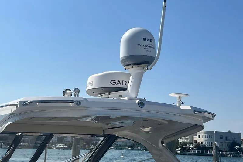 Slide: The Image of 2017 Regal 35 Sport Coupe with radar and satellite equipment on roof. - 5