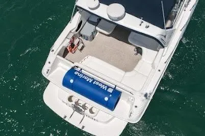 Slide: The Image of 1997 Sea Ray 400 Express Cruiser on water, aerial view. - 14
