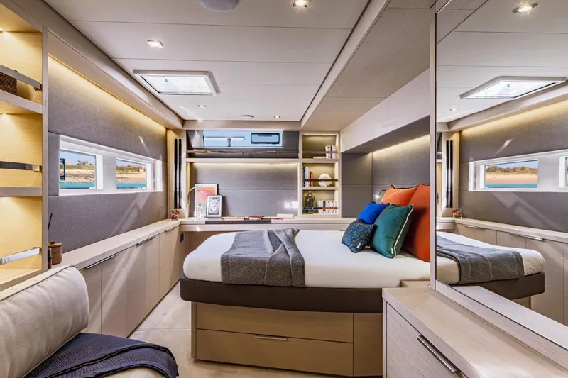 Slide: The Image of Luxurious interior of 2026 Lagoon 55 yacht with modern bedroom design and elegant decor. - 5