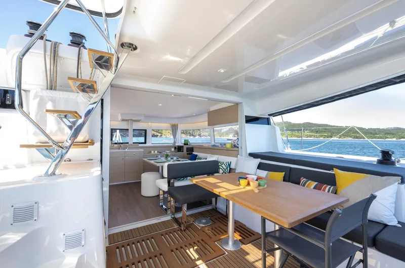 Slide: The Image of Luxurious interior of 2026 Lagoon 43 yacht with modern seating and ocean view. - 4