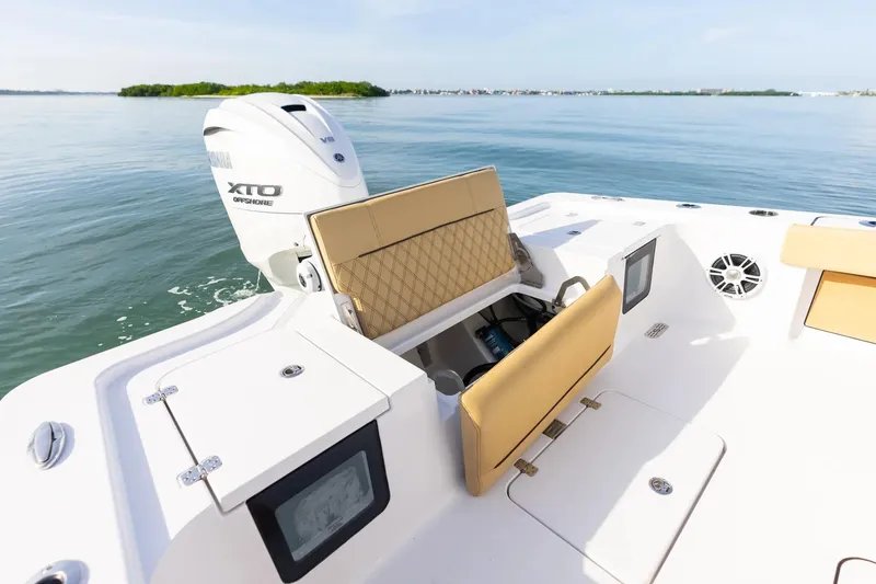 Slide: The Image of 2026 Sportsman Masters 267OE Bay Boat with Yamaha XTO Offshore engine on calm water. - 17