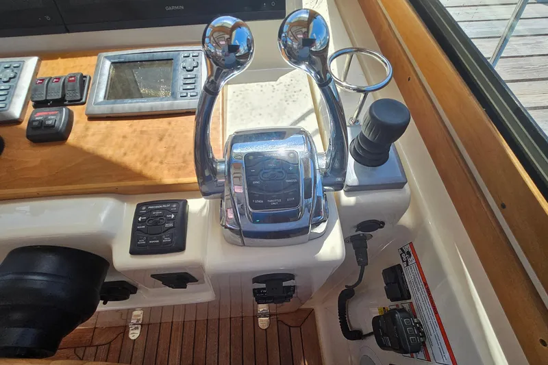 Slide: The Image of Overhead view of 2009 Sabre 42 Express yacht on dark water. - 13
