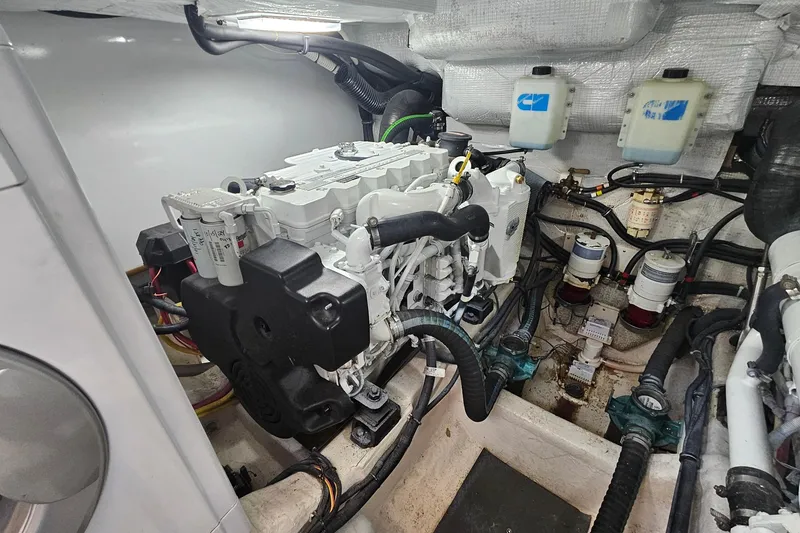 Slide: The Image of 2009 Sabre 42 Express yacht interior with wooden finish and compact bathroom. - 45