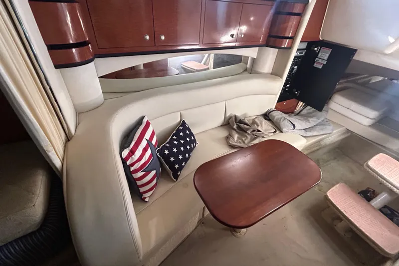 Slide: The Image of Compact bathroom in 2005 Sea Ray 300 Sundancer boat, featuring toilet and sink. - 8