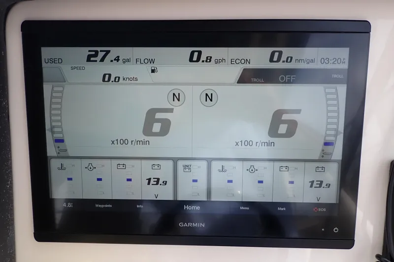 Slide: The Image of Garmin display on 2021 Grady-White Freedom 275 showing fuel and engine data. - 17