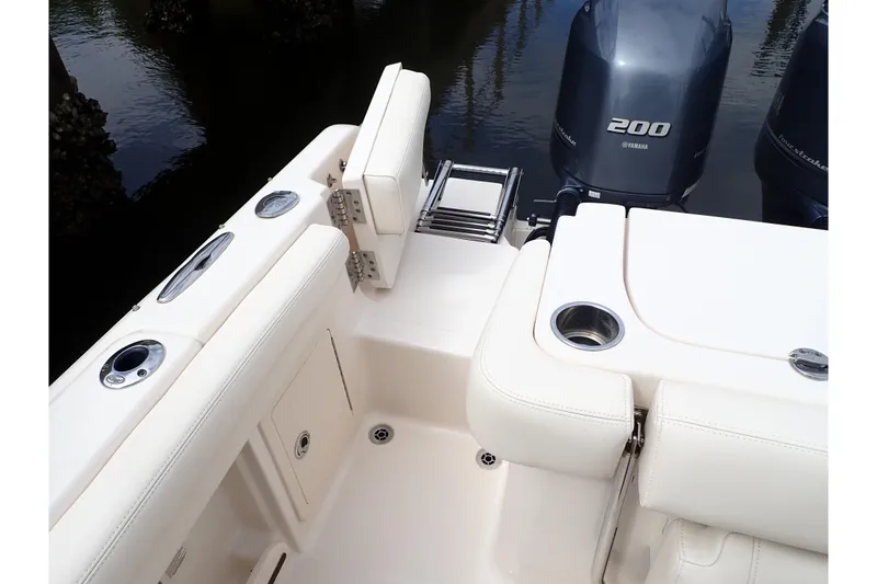 Slide: The Image of 2021 Grady-White Freedom 275 boat interior with Yamaha 200 engines. - 28