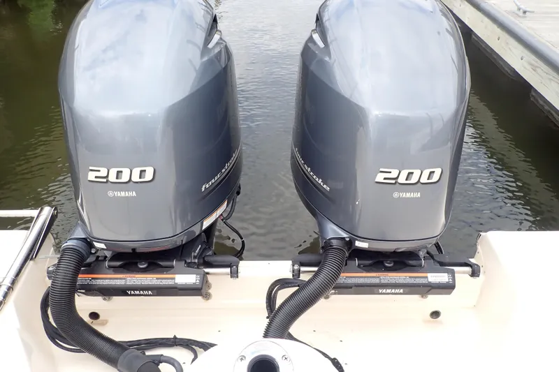 Slide: The Image of Twin Yamaha 200 outboard engines on 2021 Grady-White Freedom 275 boat. - 47