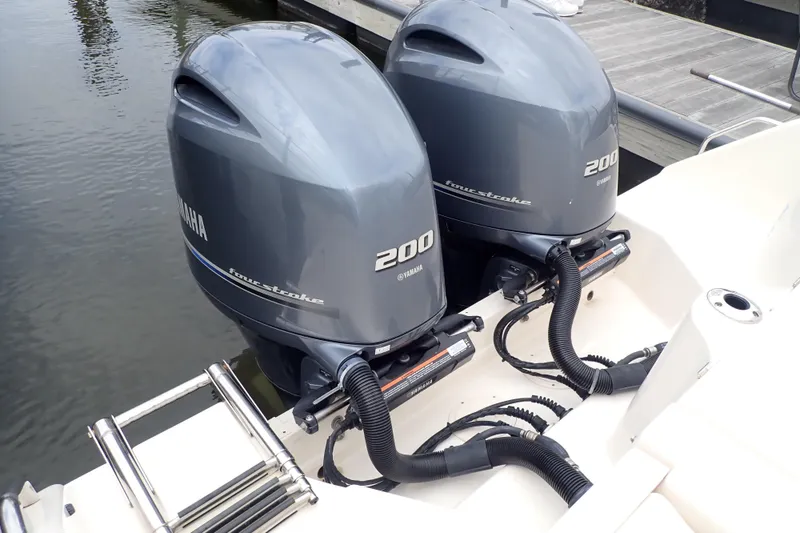 Slide: The Image of Twin Yamaha 200 four-stroke engines on 2021 Grady-White Freedom 275 boat. - 48