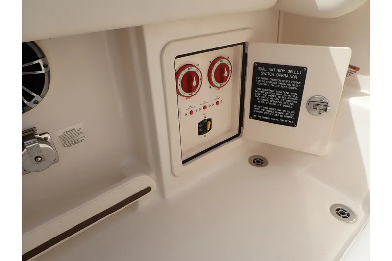Slide: The Image of 2021 Grady-White Freedom 275 boat battery switch panel with dual operation controls. - 50