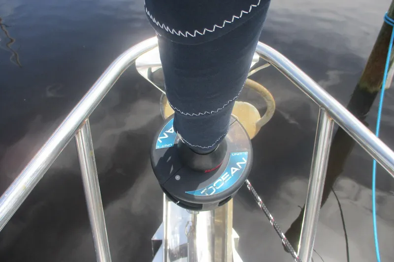 Slide: The Image of Close-up of a 2003 Hunter 356 sailboat's furling system on calm water. - 23