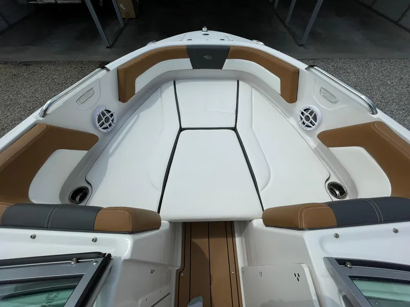 Slide: The Image of 2026 Chaparral 21 SSi boat interior with steering wheel and captain's seat. - 13