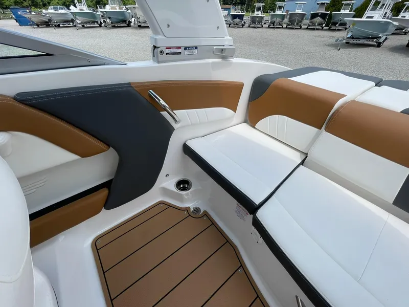 Slide: The Image of Engine compartment of 2026 Chaparral 21 SSi boat featuring a Mercury 4.5L 250 HP engine. - 37