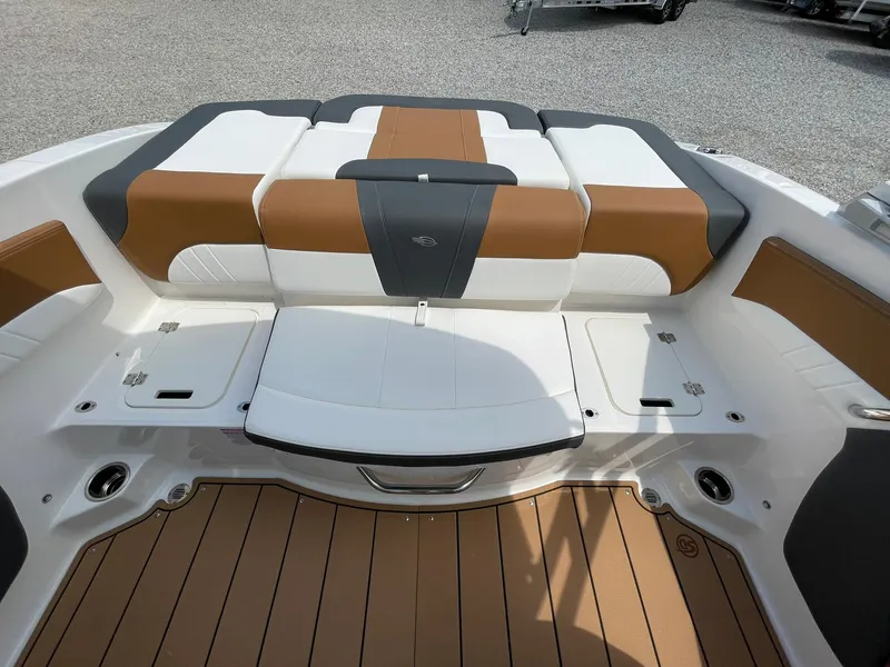 Slide: The Image of 2026 Chaparral 21 SSi boat interior with Clarion audio system and emblem. - 39