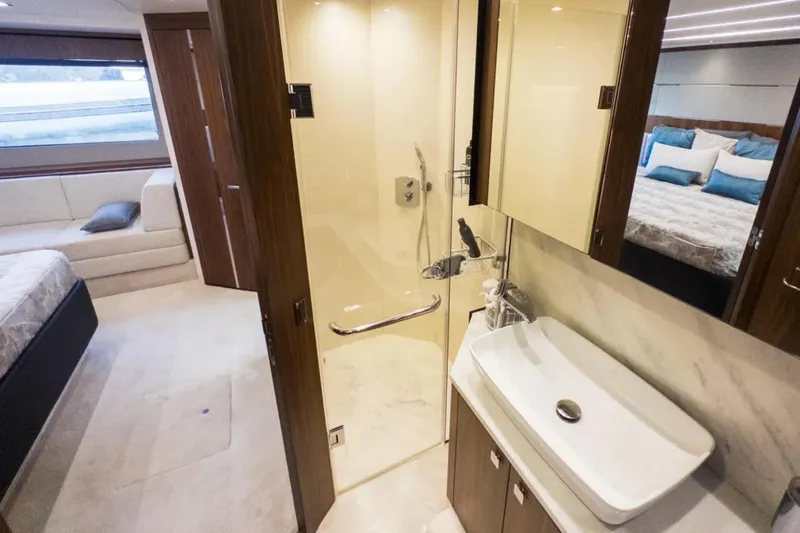Slide: The Image of Luxurious bathroom interior on 2020 Sunseeker Predator 74 yacht, featuring modern design and amenities. - 21