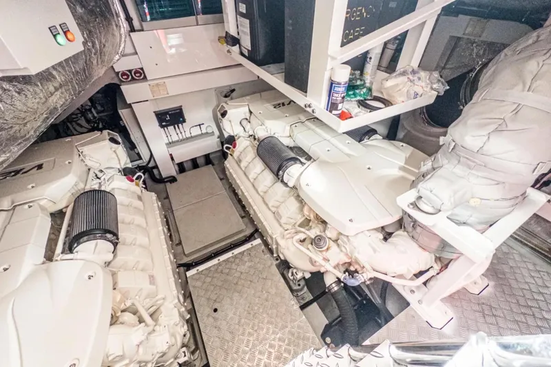 Slide: The Image of Engine room of 2020 Sunseeker Predator 74 yacht, featuring dual engines and equipment. - 24