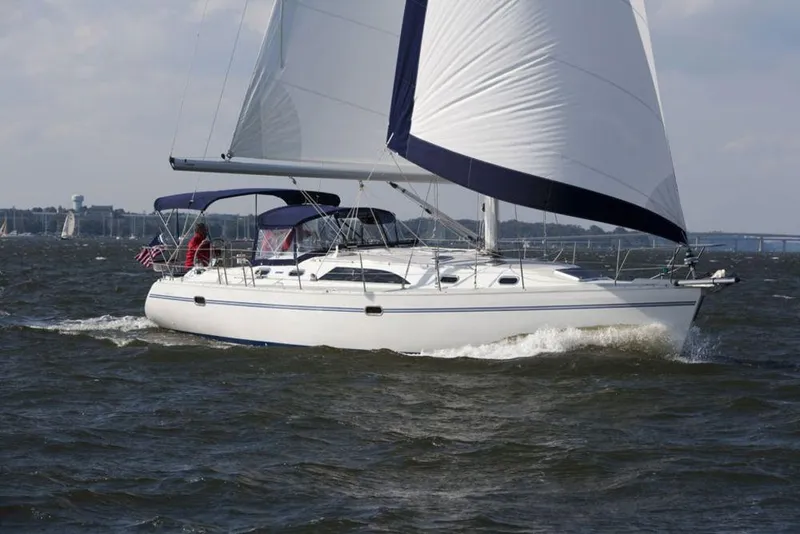 The Image of Sailing Catalina 445 yacht, 2026 model, cruising on open water with full sails. - 0