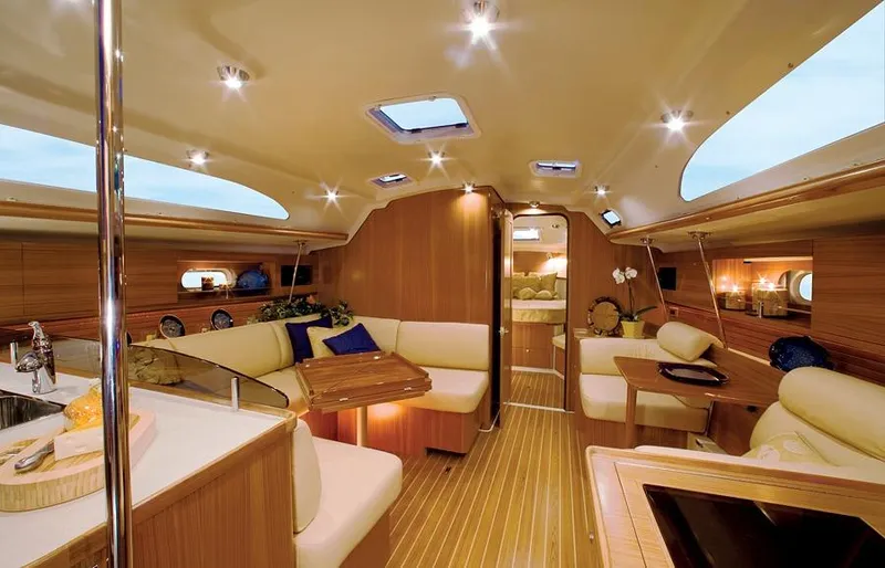 Slide: The Image of Luxurious interior of 2026 Catalina 445 yacht with elegant wood finish and plush seating. - 6