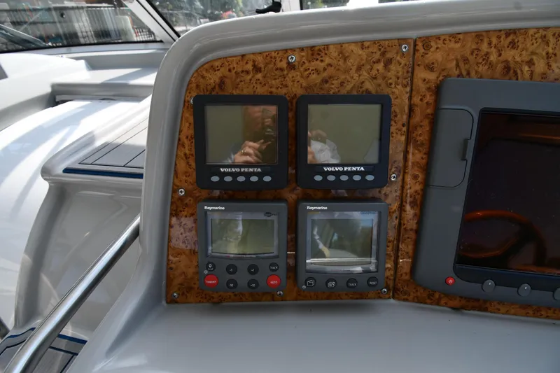 Slide: The Image of Control panel of a 2007 Formula 45 Yacht with Volvo Penta and Raymarine displays. - 11