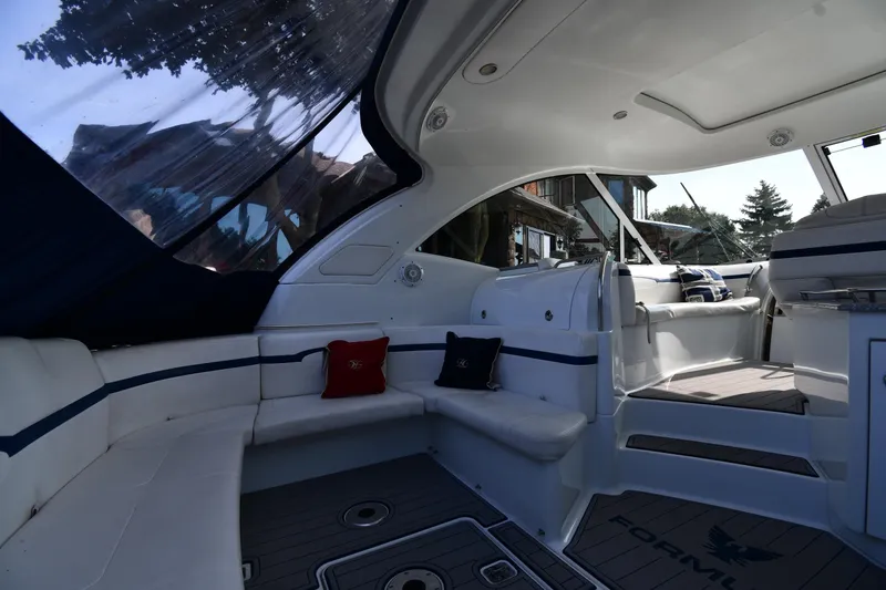 Slide: The Image of Luxurious interior of a 2007 Formula 45 Yacht with plush seating and elegant design. - 17