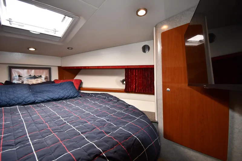 Slide: The Image of Cozy bedroom interior of 2007 Formula 45 Yacht with modern decor and natural light. - 29
