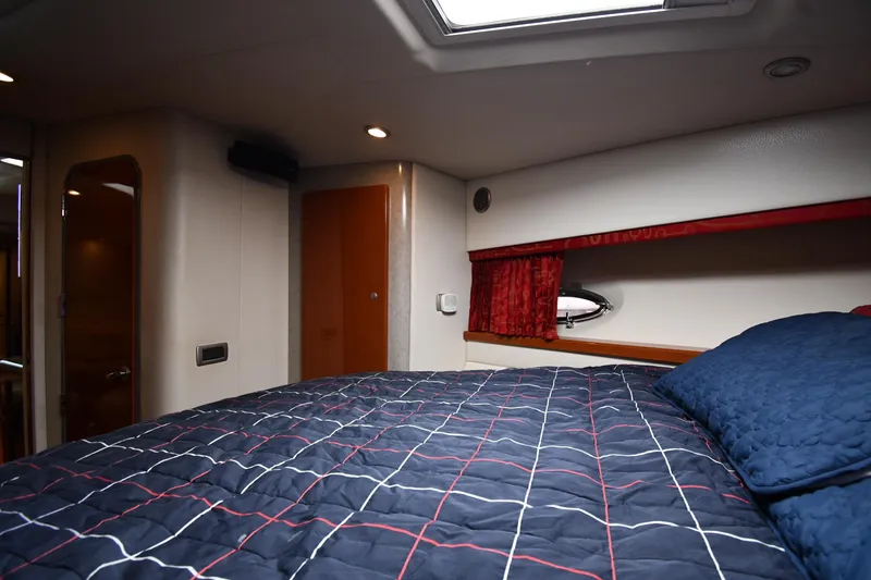 Slide: The Image of Interior cabin of 2007 Formula 45 Yacht with bed and porthole window. - 31