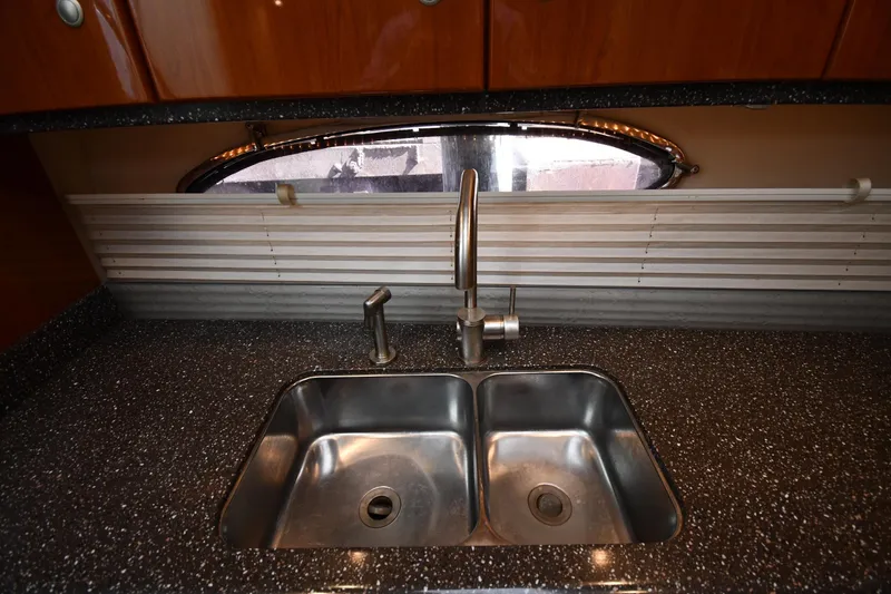 Slide: The Image of Stainless steel sink in 2007 Formula 45 Yacht kitchen with modern faucet. - 41