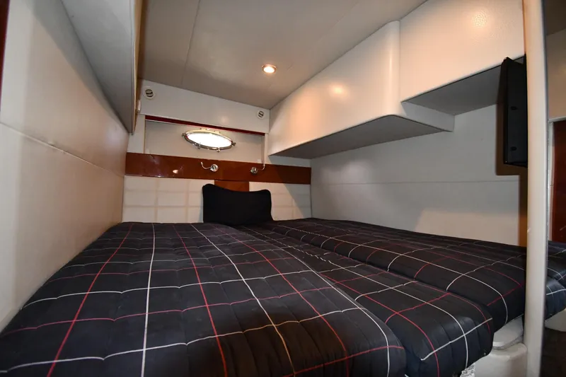 Slide: The Image of 2007 Formula 45 Yacht interior cabin with cozy bed and modern design. - 46