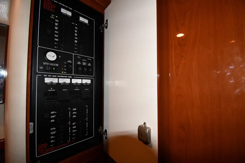 Slide: The Image of Electrical panel inside 2007 Formula 45 Yacht, featuring various switches and gauges. - 51