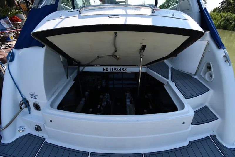 Slide: The Image of 2007 Formula 45 Yacht engine compartment open, showcasing interior mechanics and design. - 52