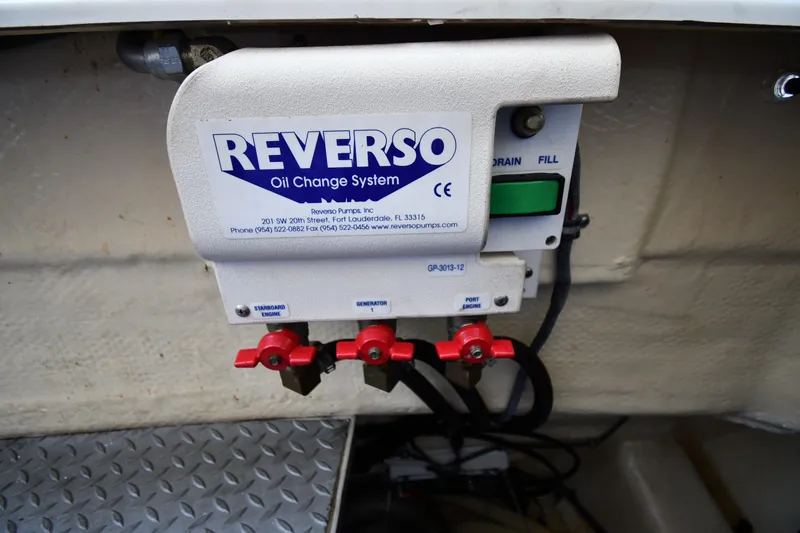 Slide: The Image of Reverso oil change system on 2007 Formula 45 Yacht, featuring drain and fill controls. - 67