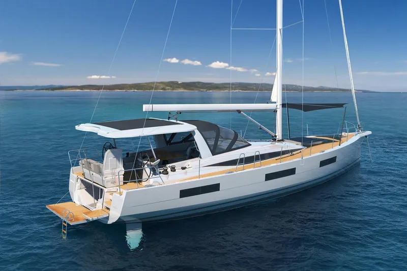 Slide: The Image of 2026 Jeanneau Yachts 60 sailing on calm blue waters, showcasing sleek design and modern features. - 10