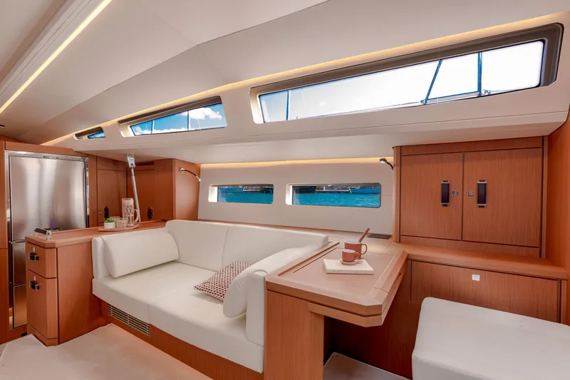Slide: The Image of Luxurious interior of 2026 Jeanneau Yachts 60, featuring elegant seating and modern design. - 12
