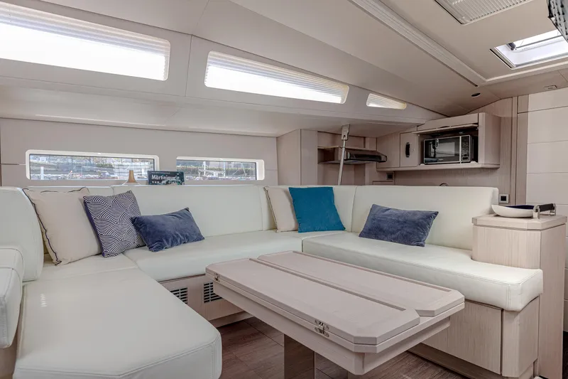 Slide: The Image of Luxurious interior of 2026 Jeanneau Yachts 60 with plush seating and modern amenities. - 13