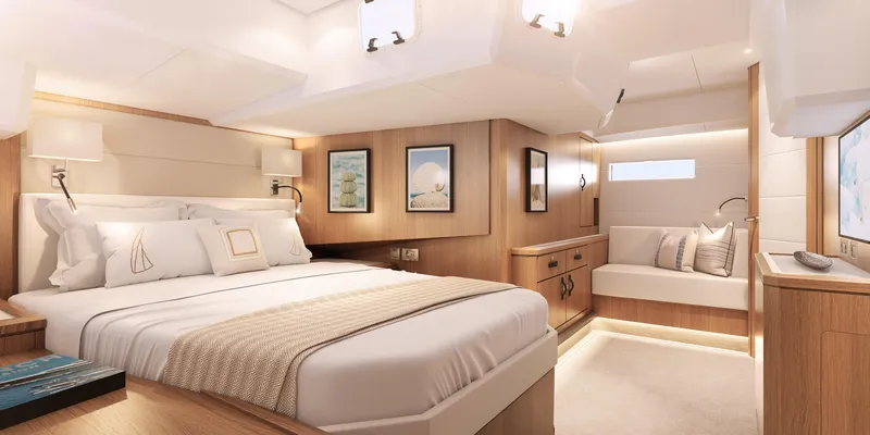 Slide: The Image of Luxurious bedroom interior of 2026 Jeanneau Yachts 60, featuring elegant wood finishes and modern decor. - 15