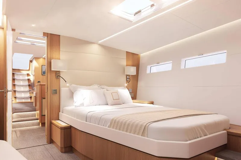 Slide: The Image of Luxurious bedroom interior of 2026 Jeanneau Yachts 60, featuring modern design and natural lighting. - 16
