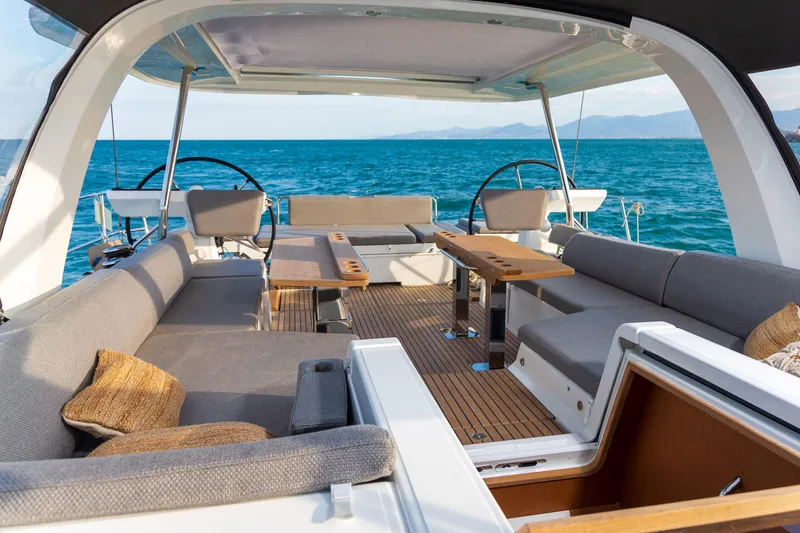 Slide: The Image of Luxurious 2026 Jeanneau Yachts 60 with spacious deck and ocean view. - 4